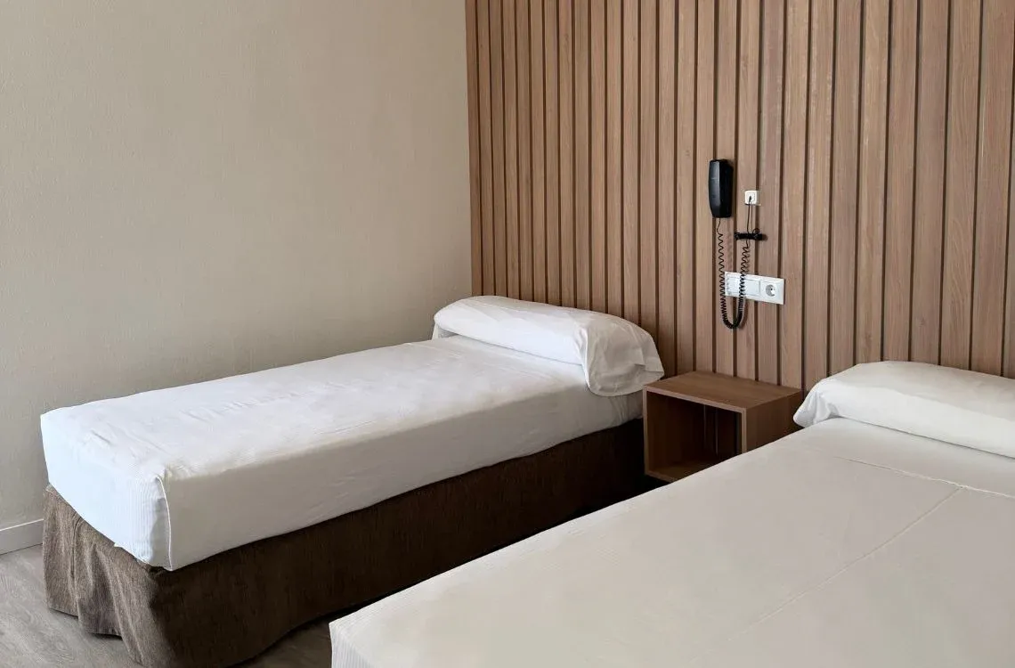 Habitación con dos camas individuales, ideal paraHotel Victoria Centro.