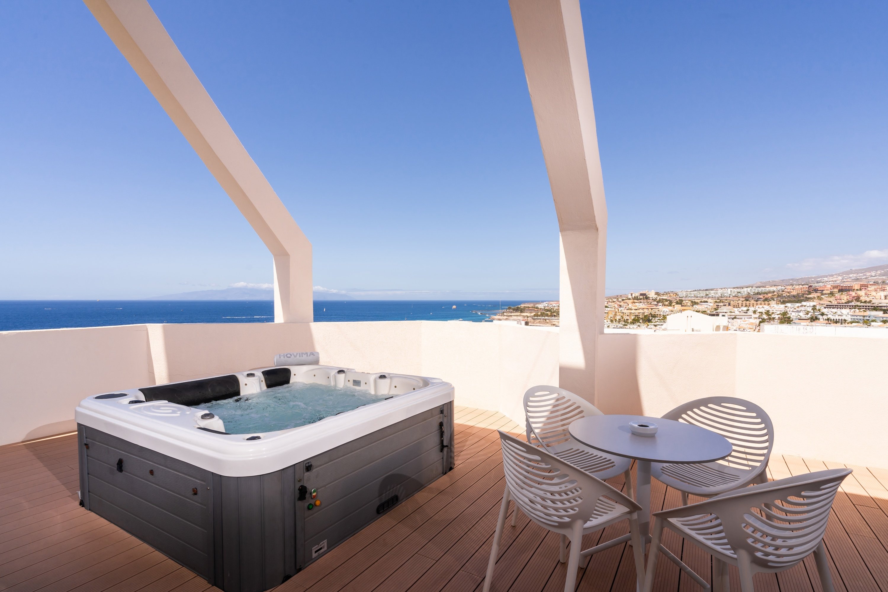 a living room with a couch a chair and a table