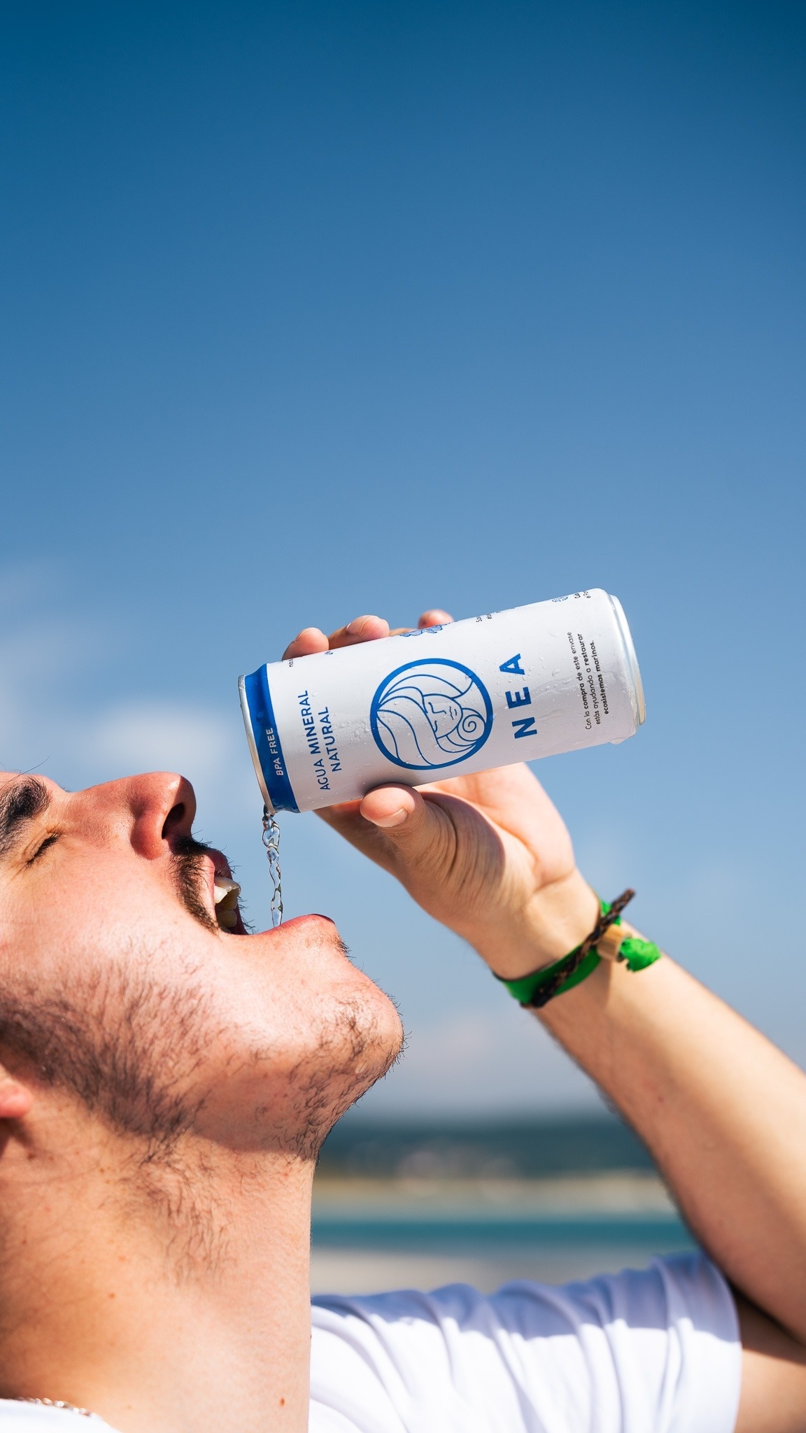 an aerial view of a sandy island in the middle of the ocean
