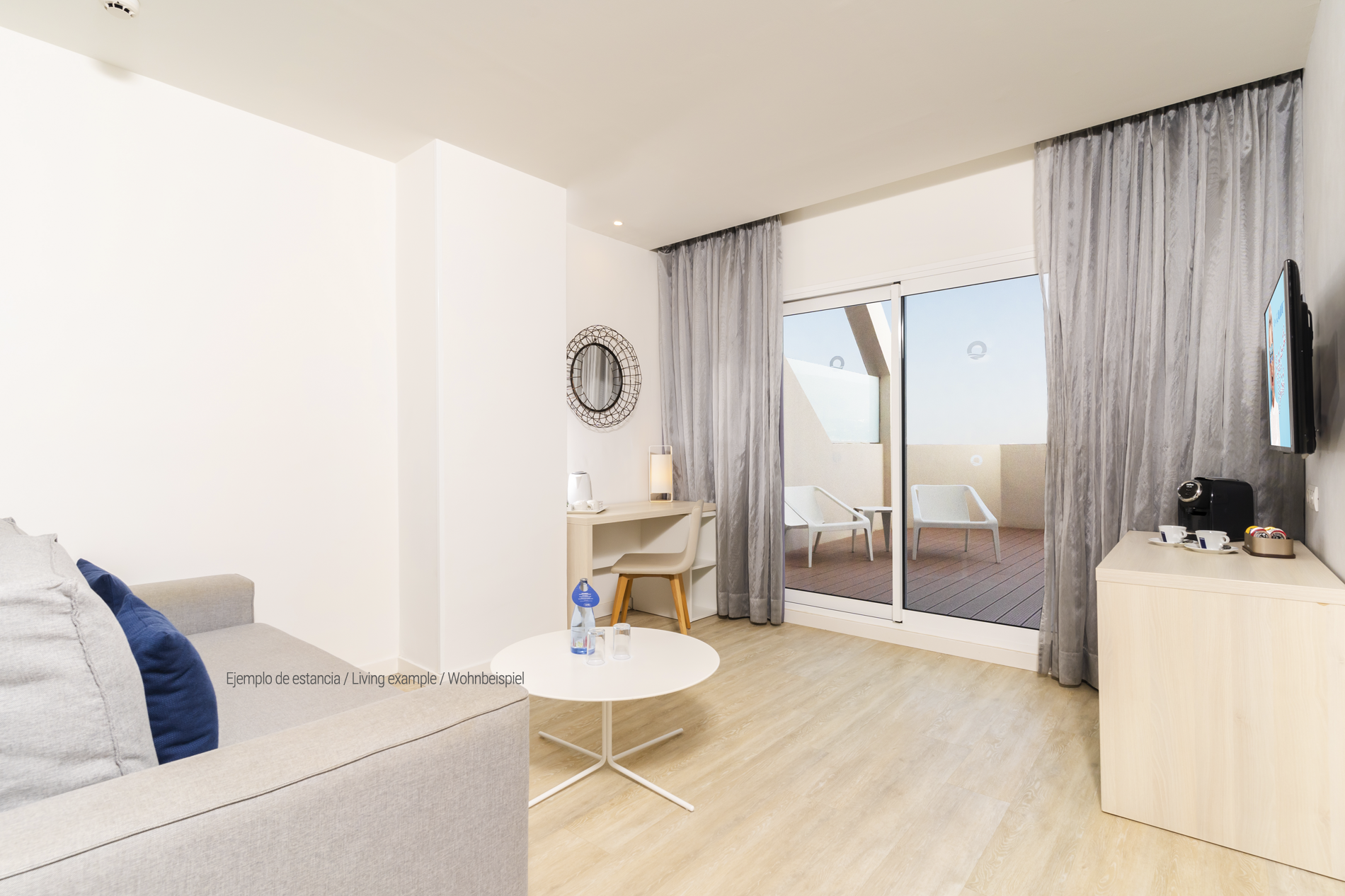 a hotel room with a bed and a sign that says hovim