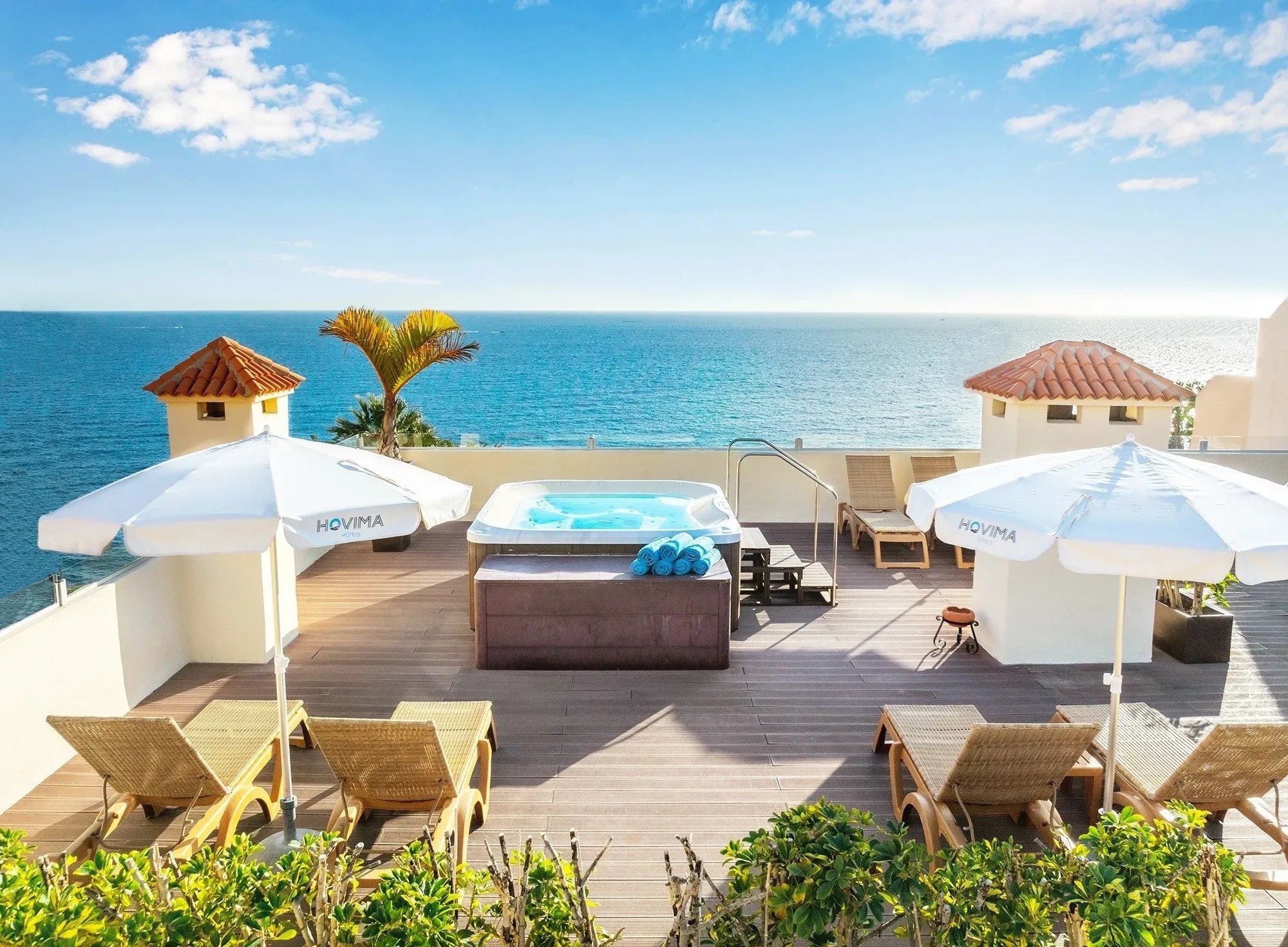 an aerial view of a sandy island in the middle of the ocean
