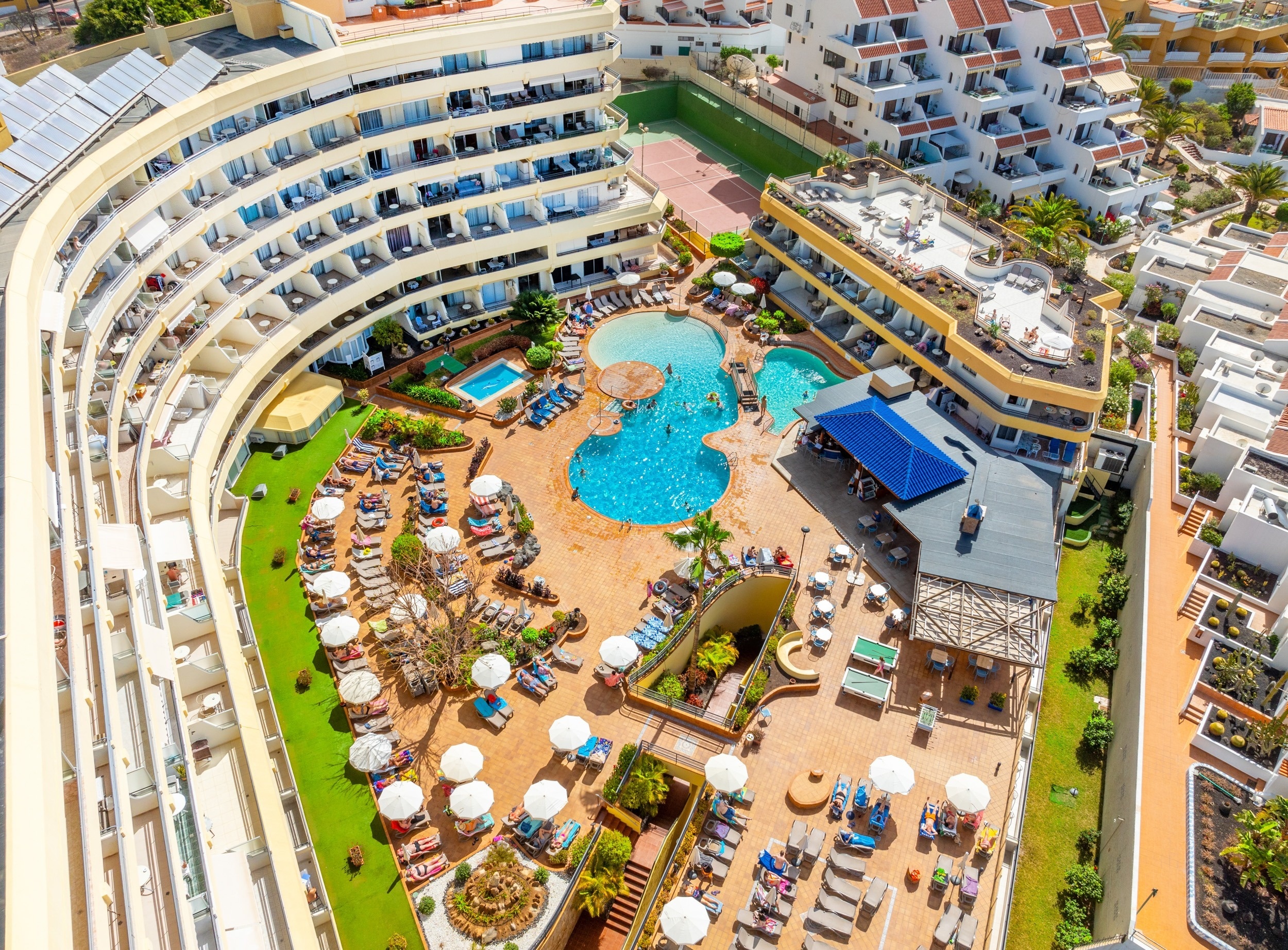 
                                    an aerial view of a sandy beach with blue water