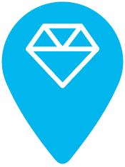 un pin azul con un sol y olas en él