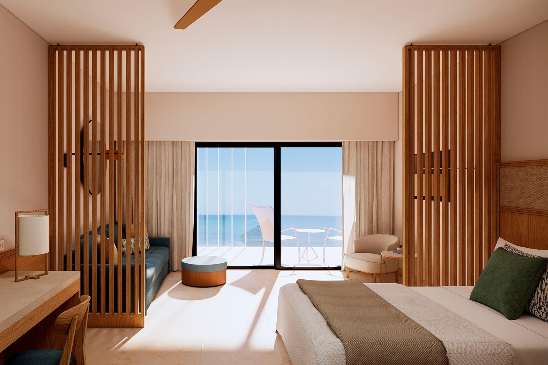 ein Hotelzimmer mit einem großen Bett und einer blauen Couch