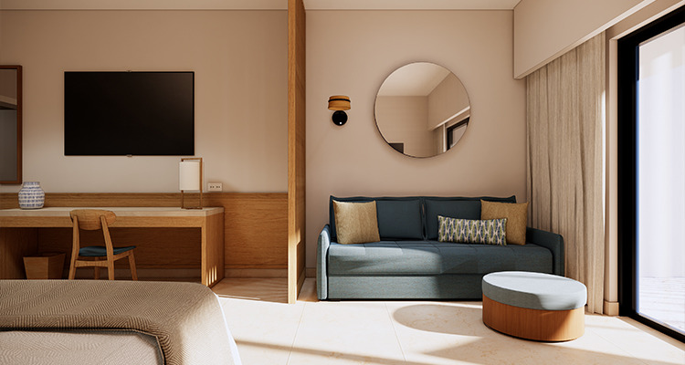 Quarto de hotel moderno com cama, sofá, TV e secretária. Impressive Royal Punta Cana