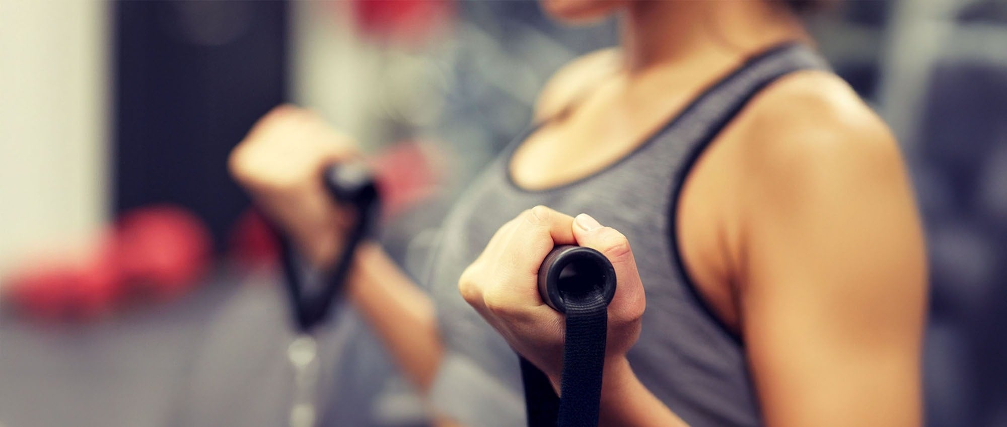 an aerial view of a sandy beach with blue water