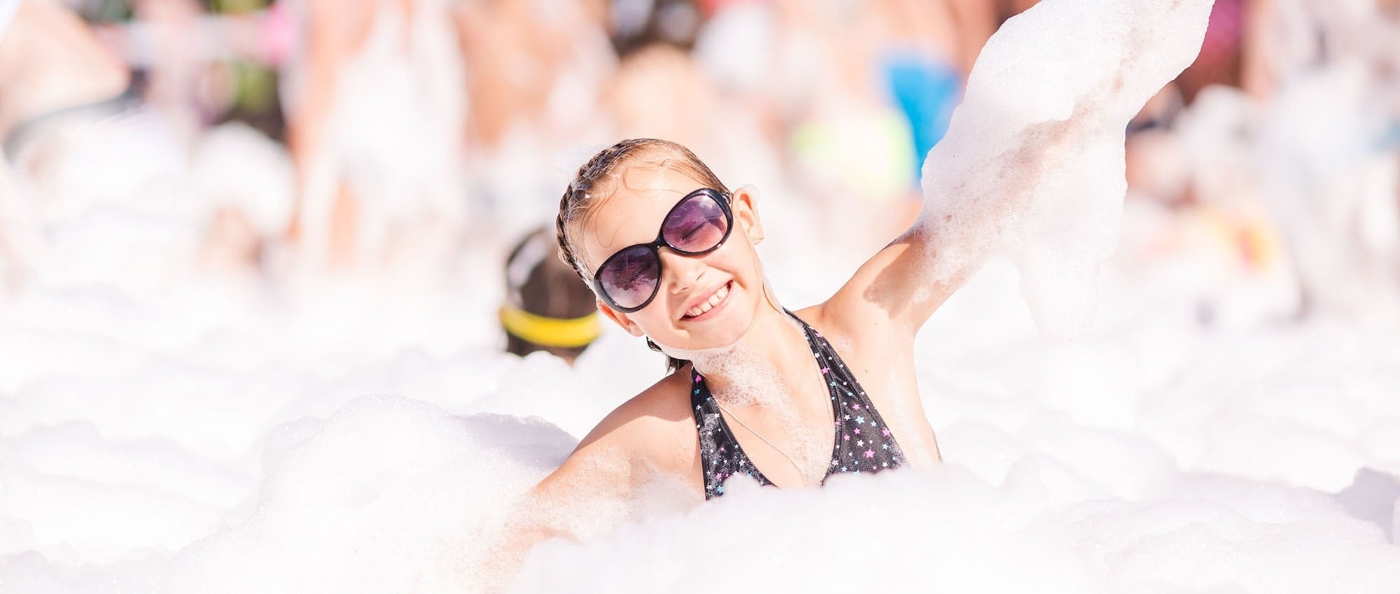 an aerial view of a sandy island in the middle of the ocean