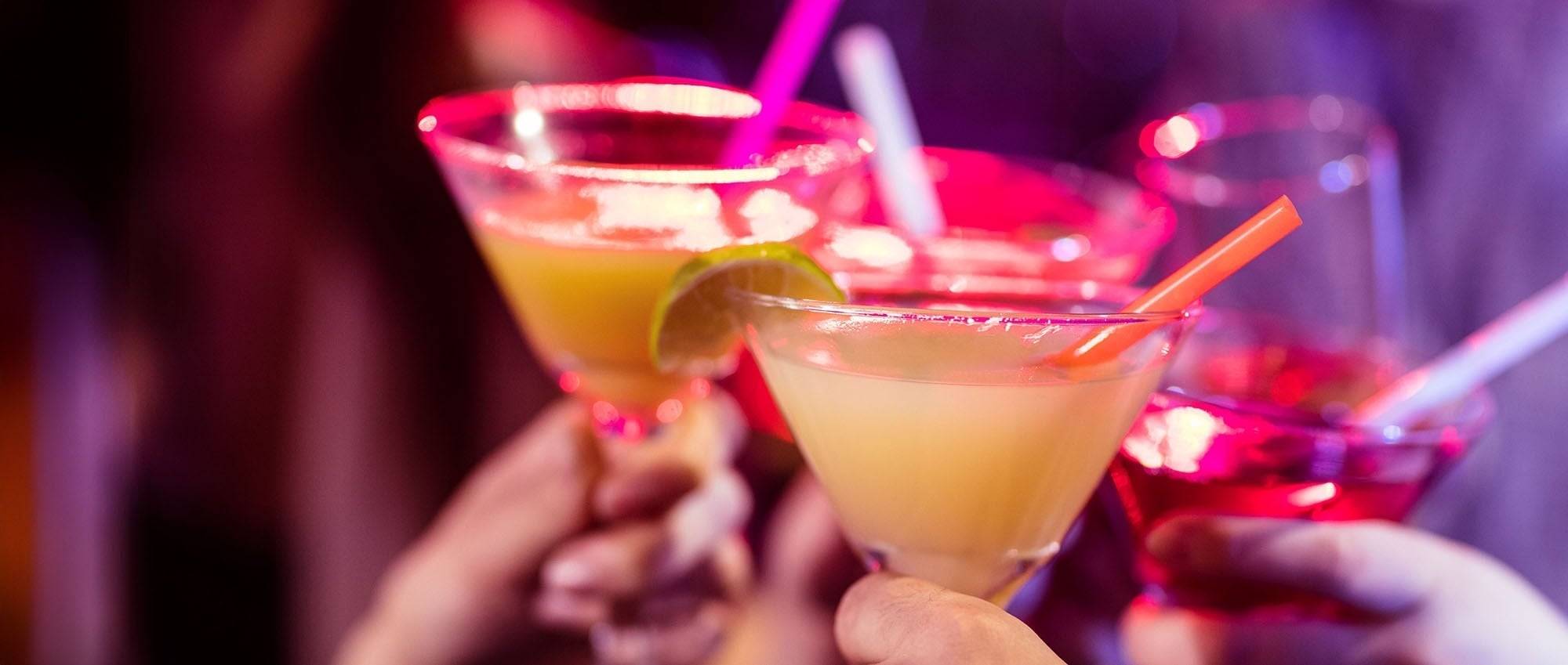 an aerial view of a sandy beach with blue water
