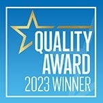 a quality award 2023 winner logo with a star on a blue background .