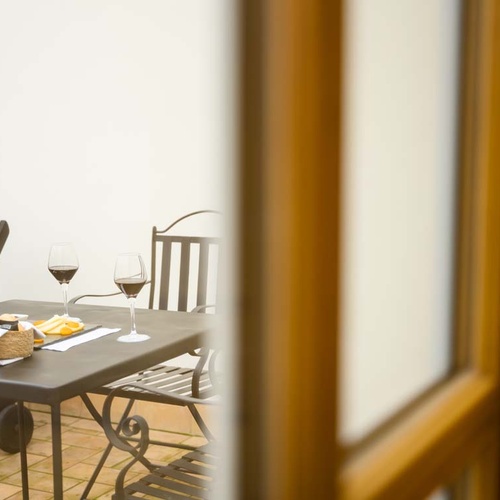 Enjoy wine & cheese on your patio in Juderia: Cordoba.