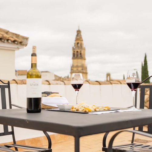 Rooftop wine and cheese overlooking the Judería: Córdoba skyline.
