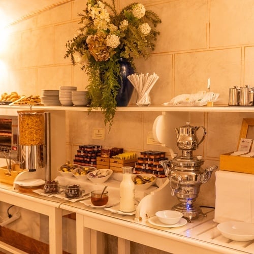Juderia: Sevilla breakfast buffet with pastries, cereals, teas, and beverages.