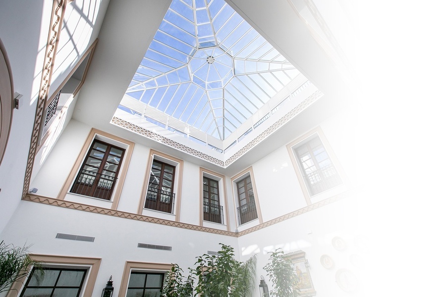 looking up at a skylight in a building