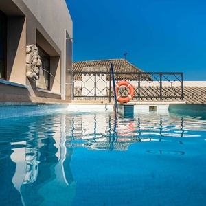 a swimming pool with a life preserver in it