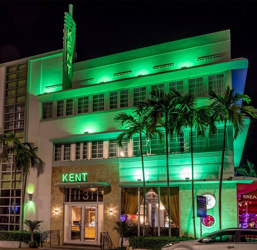 a large white building with kent written on the front