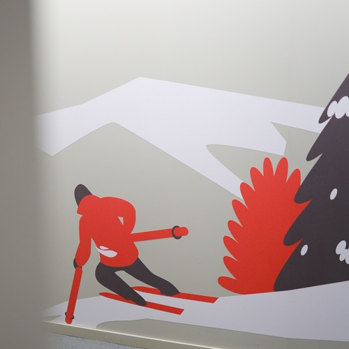 un dibuix d' un esquiador i un arbre de nadal