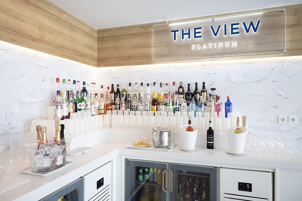 a bar with a sign that says the view platinum