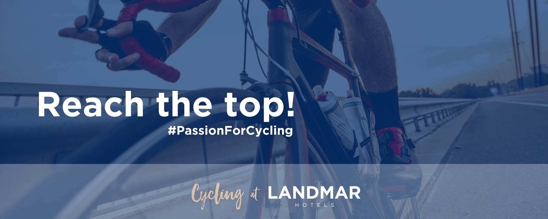 a person riding a bike with the words reach the top