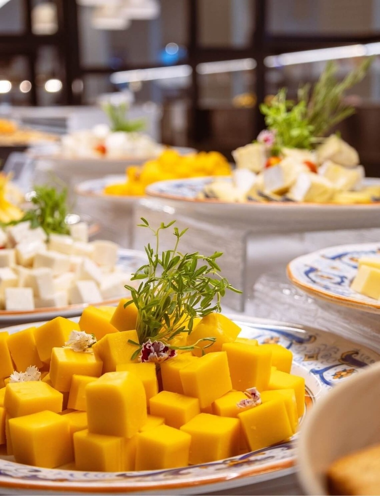 Landmark: Enjoy delicious cheeses and fresh fruits at our buffet.
