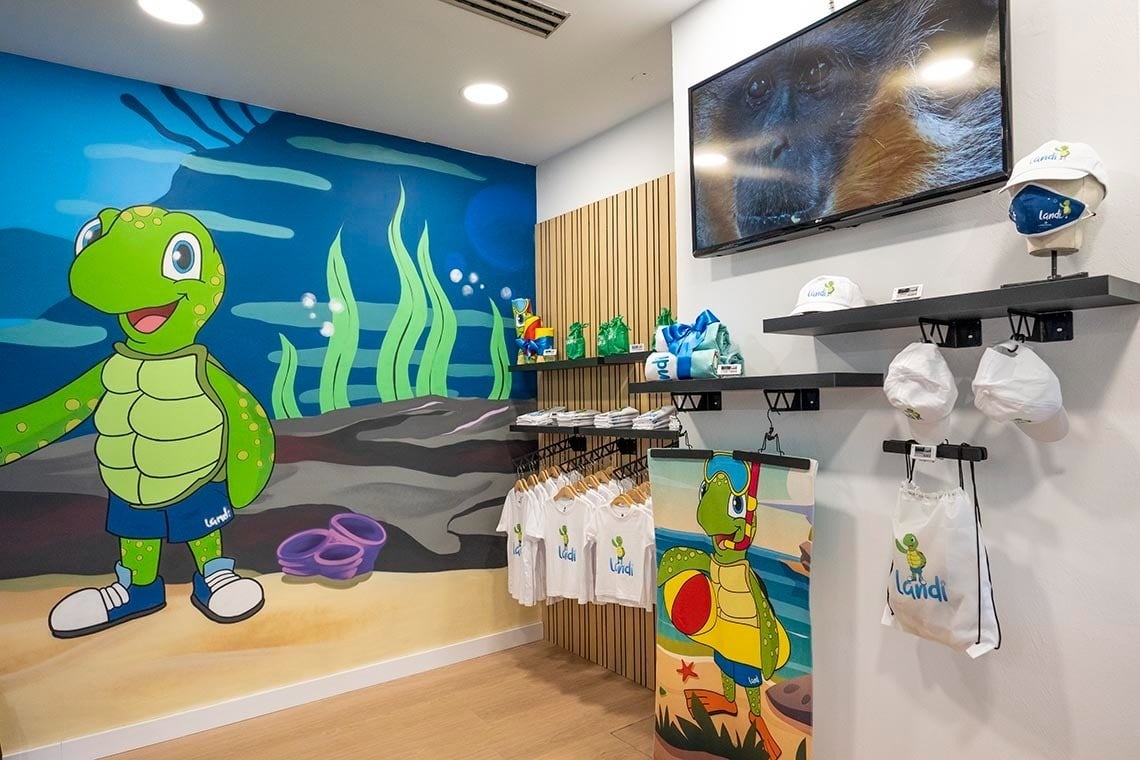 a store with a painting of a turtle on the wall