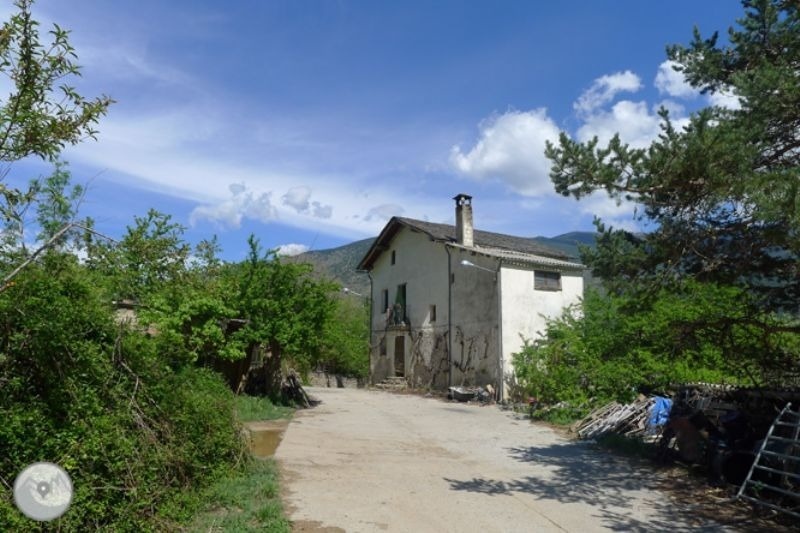 a house with a chimney on the top of it