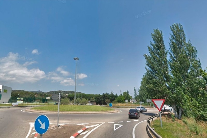 a roundabout with a sign that says ' a ' on it