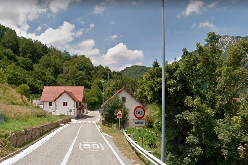 a road with a sign that says 50 on it
