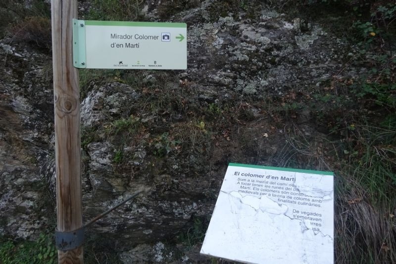 un cartell que diu mirador coloner d' en marti