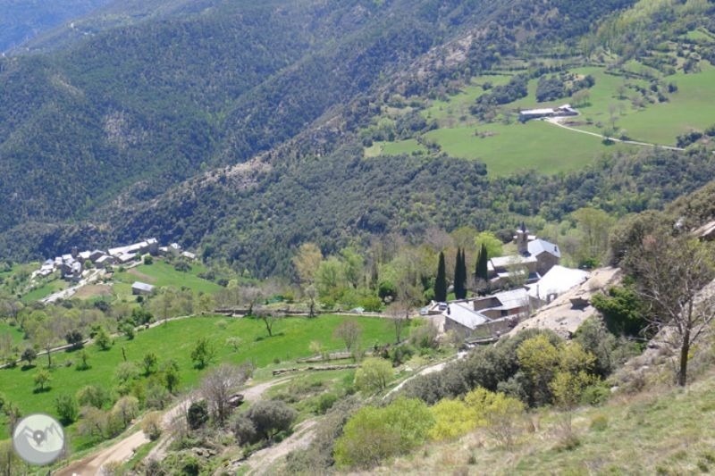 a valley with a white building in the middle of it