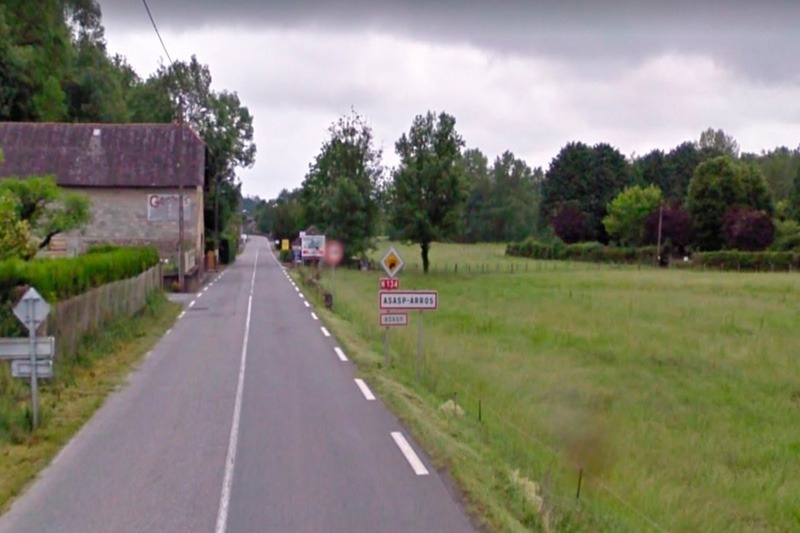 a sign on the side of a road that says stop