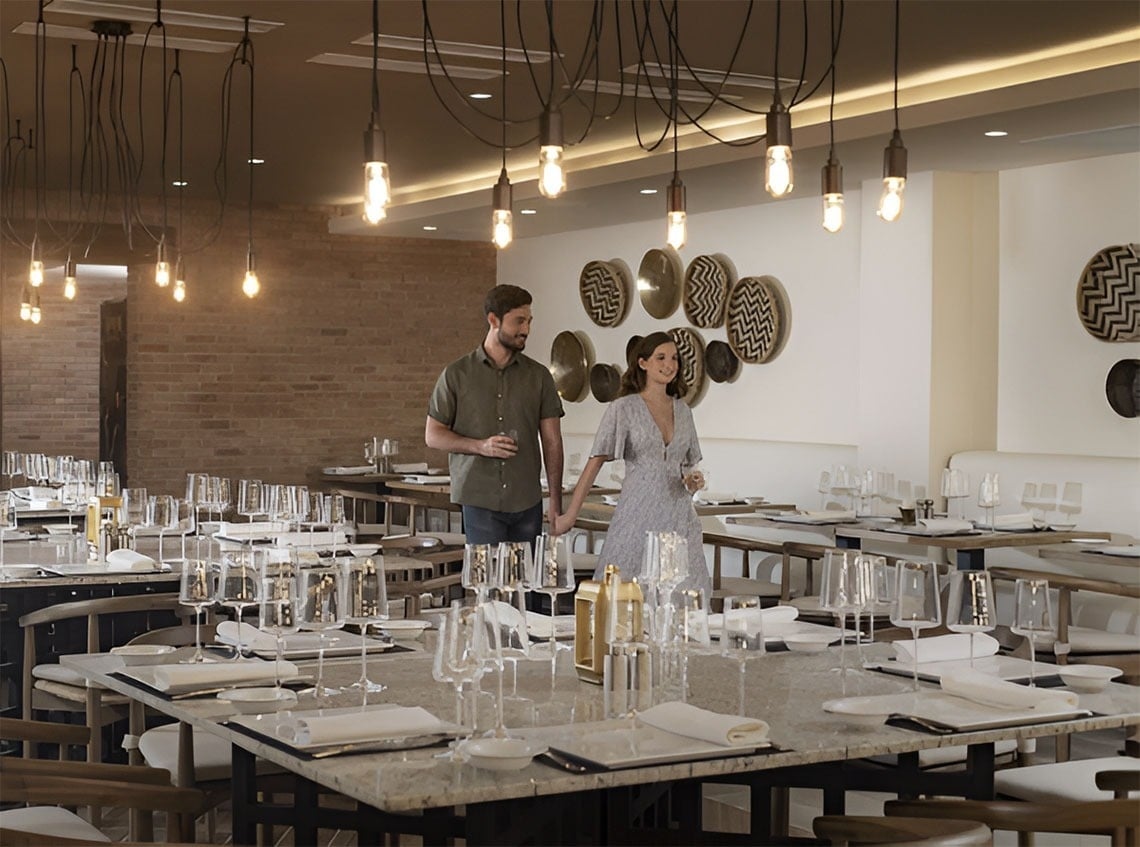 una mesa y sillas en un restaurante con lámparas colgantes