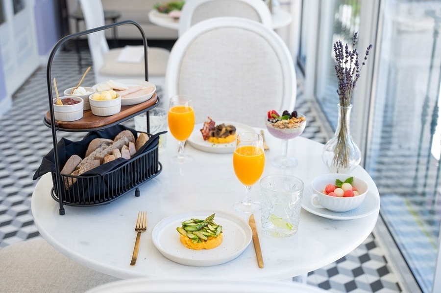 a table with a variety of food and drinks on it