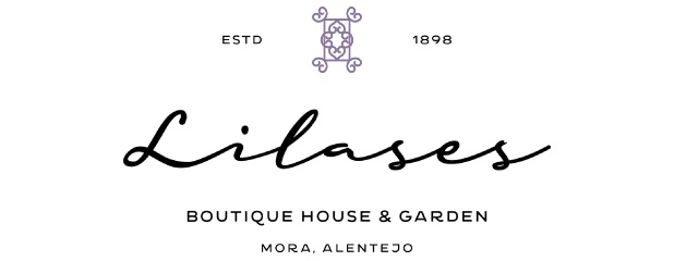 a logo for lilases boutique house and garden