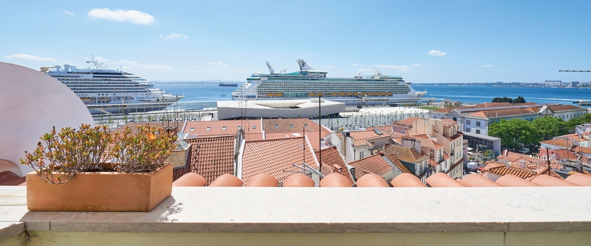 a view of a cruise ship from a balcony