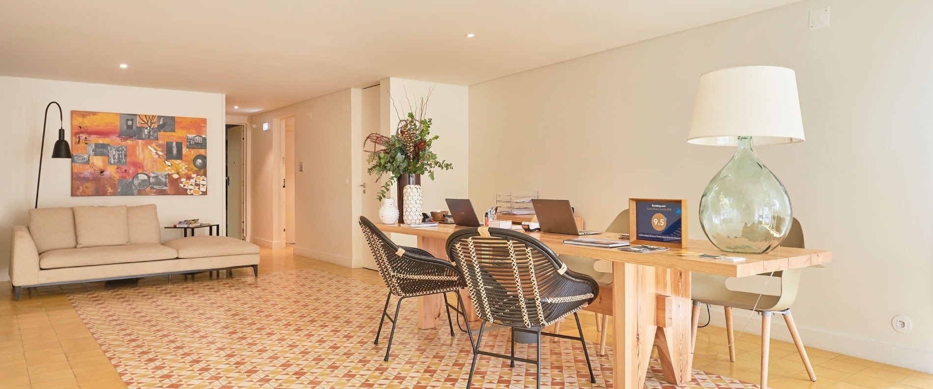 a room with a table and chairs and a sign that says ' a ' on it