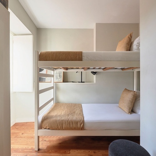 a bunk bed with two beds on top of each other