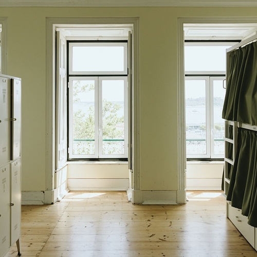 a row of white lockers with the letters l and l on them