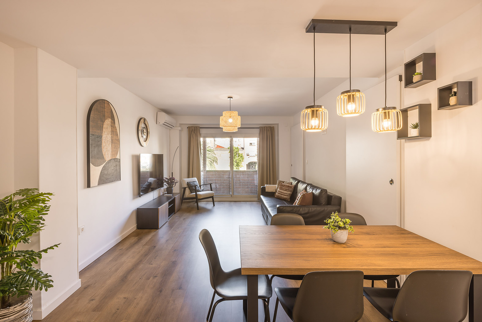 Modern dining area and living room with sofa, chairs, and table in Macflats: Ciudad de las ciencias.