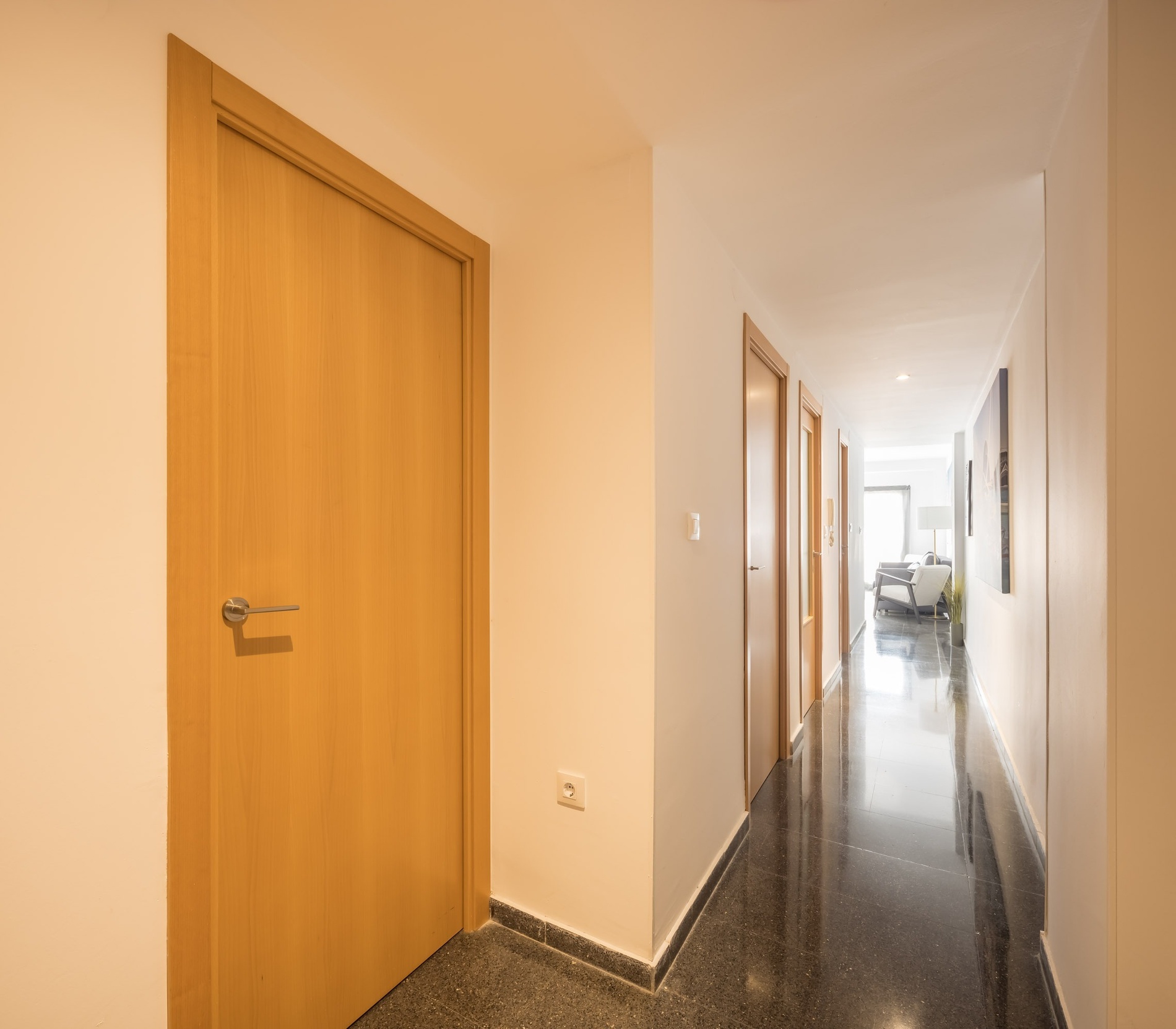 Modern hallway with wooden doors at Macflats Ciudad de las Ciencias | Valencia