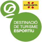 a green circle with destination de turisme esportiu written on it