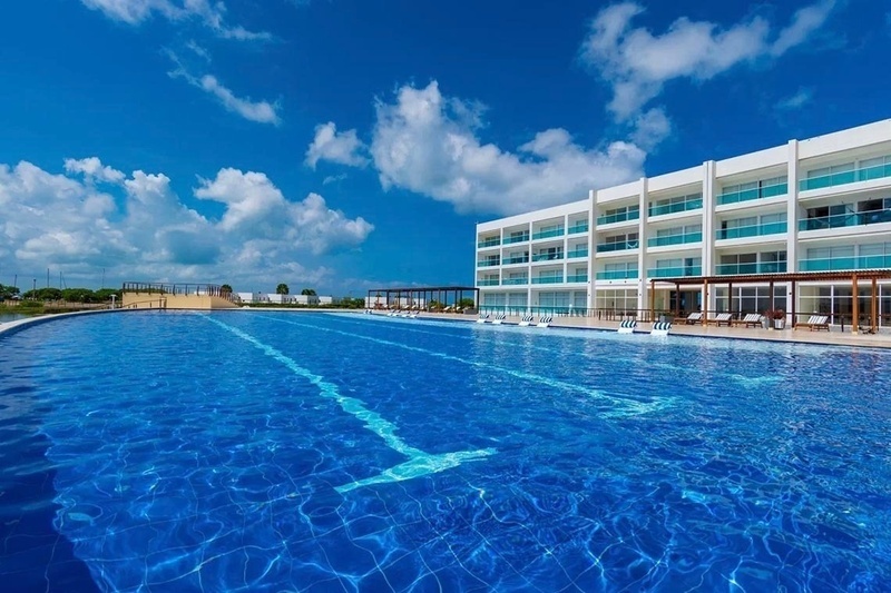 Infinity pool and modern hotel at Marina Puerto Velero