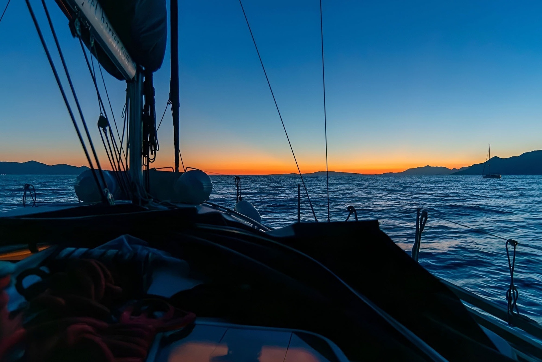 Sailboat sunset at Marina Puerto Velero, a nautical paradise.