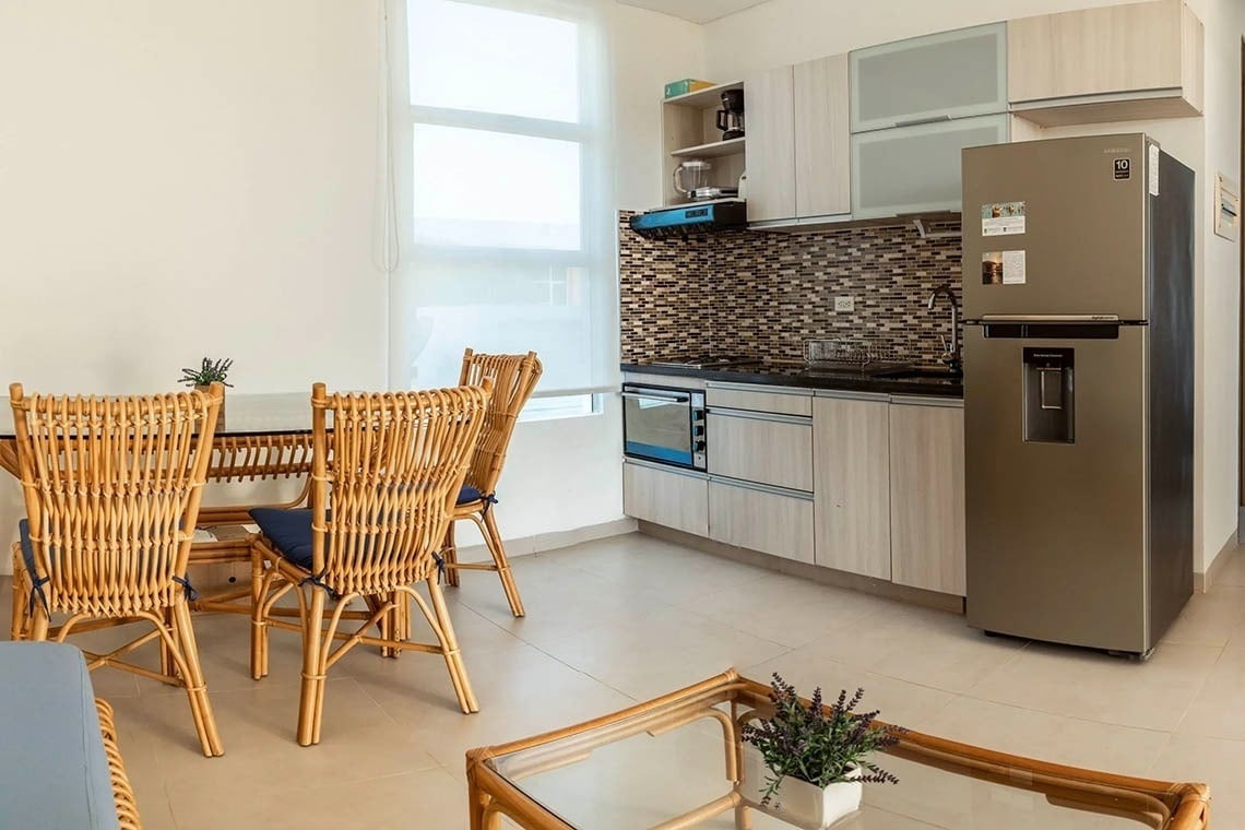 Modern dining and kitchen area at Marina Puerto Velero.