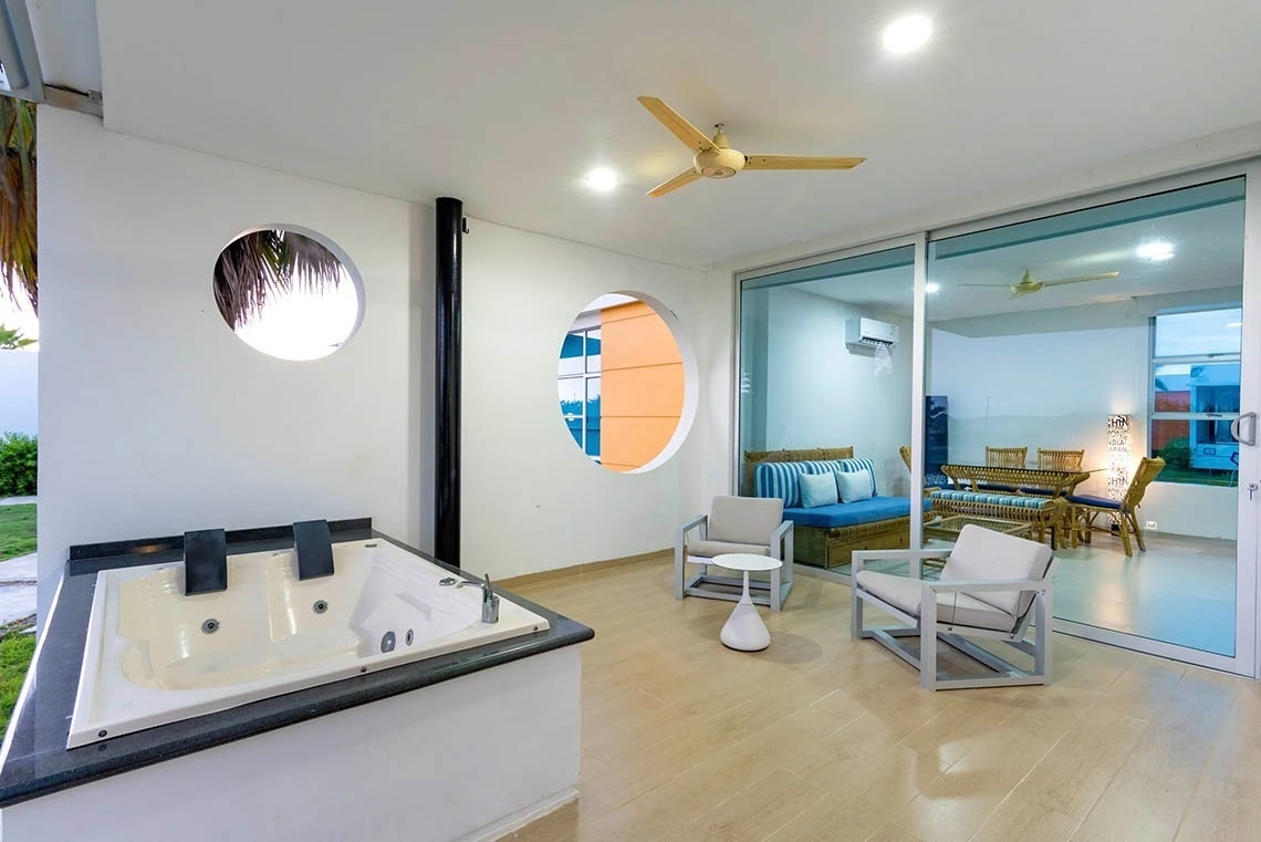 Private jacuzzi and modern living room at Marina Puerto Velero.