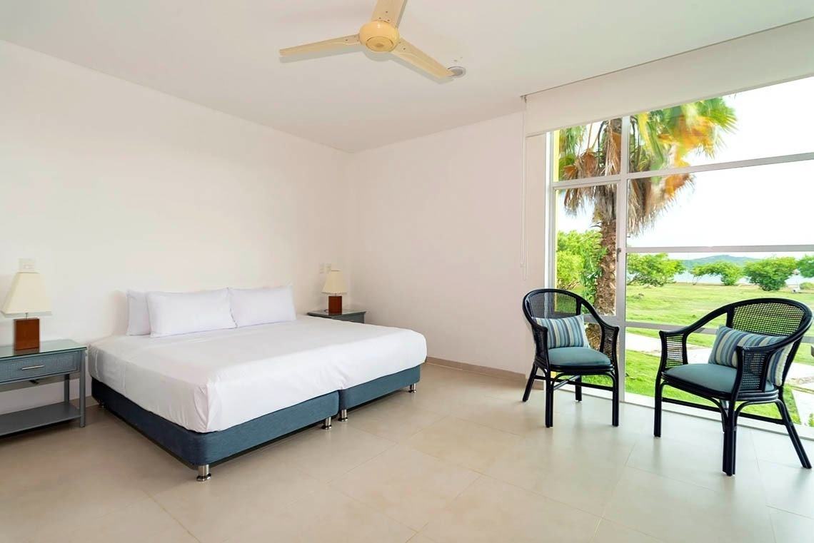 Double room with sea views at Marina Puerto Velero, comfortable and bright.