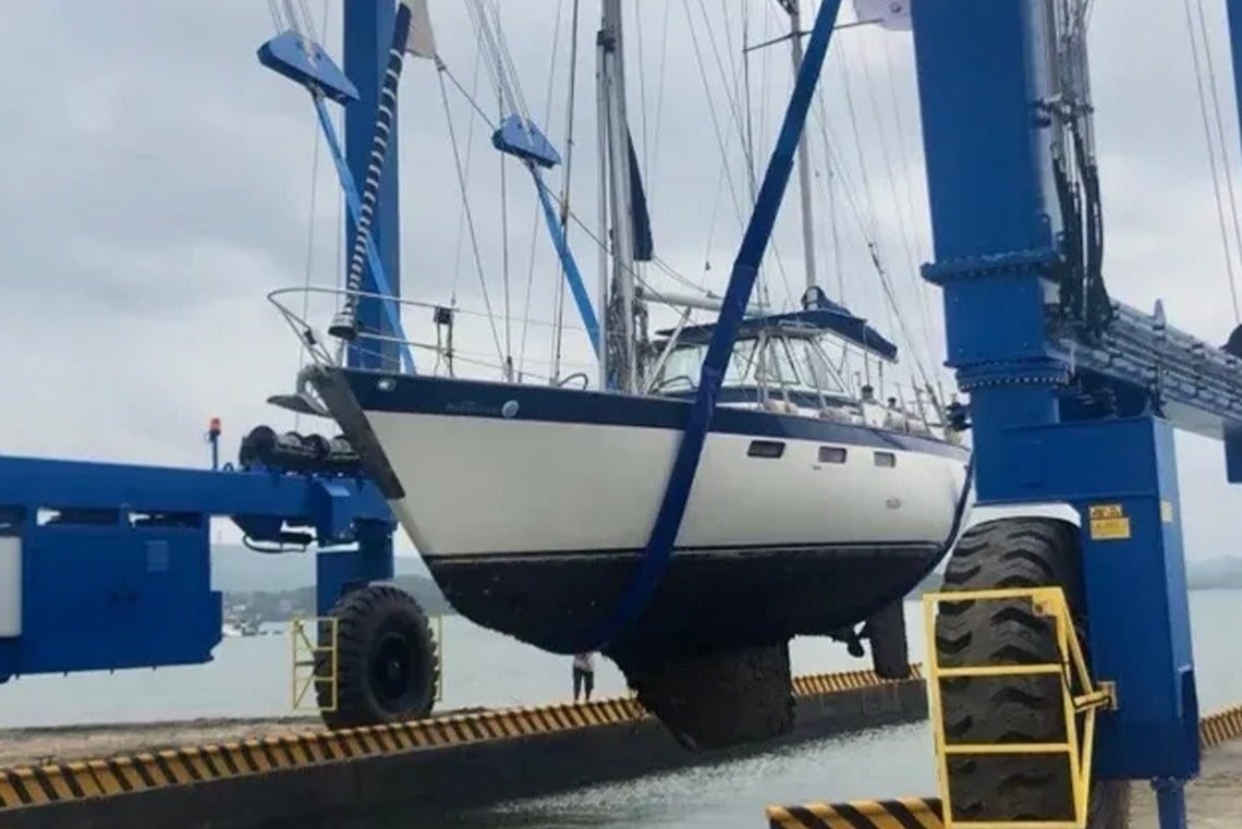 Yacht being lifted at Marina Puerto Velero