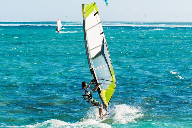 Windsurfing at Marina Puerto Velero: thrilling watersports adventure.