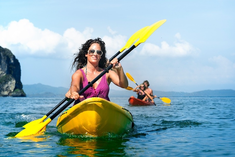 Kayaking in clear waters near Marina Puerto Velero.