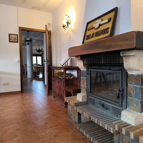 a fireplace with a sign above it that says 