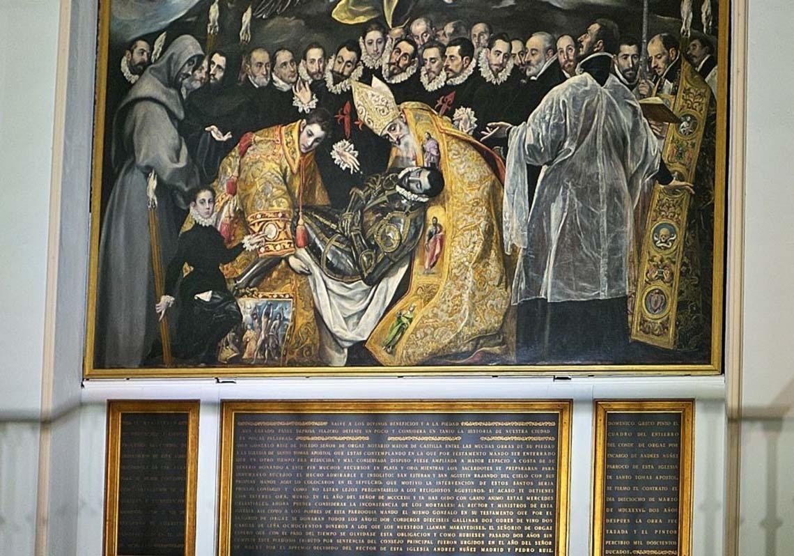 a large building with a steeple in the middle of a city